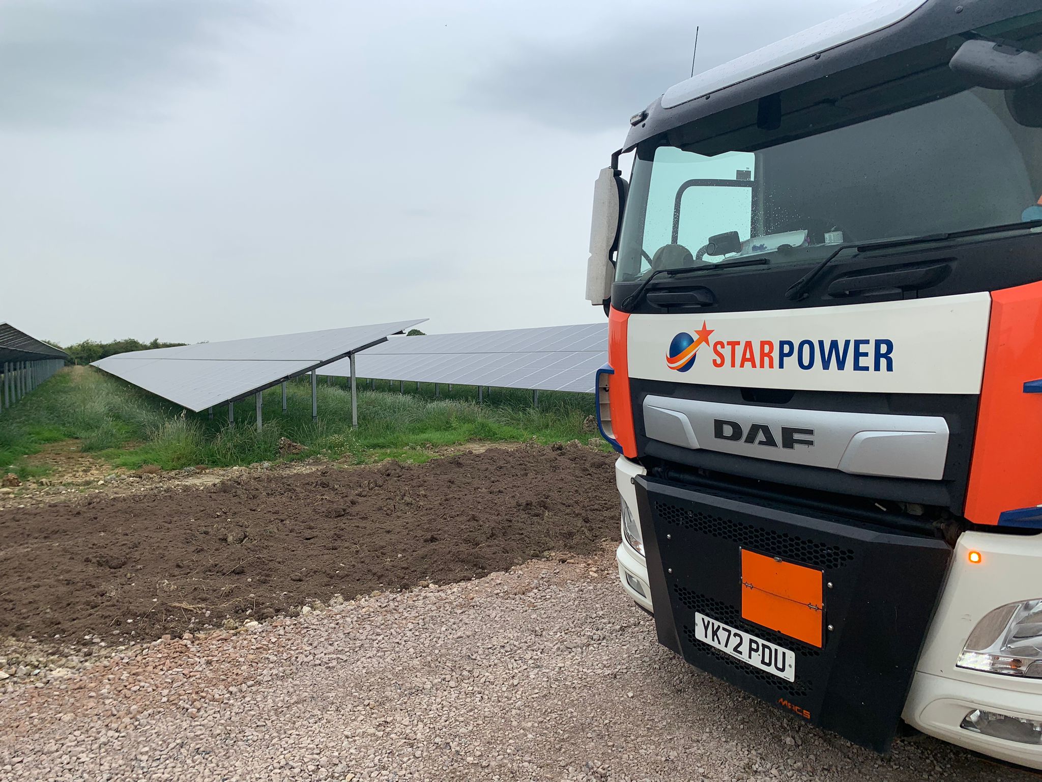Star Power lorry at a solar panel farm/station