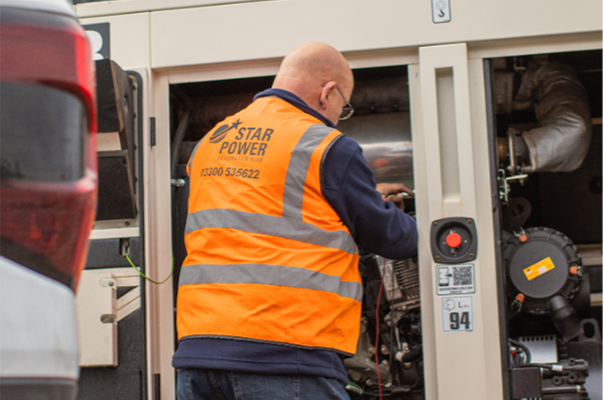 Man on job fixing equipment